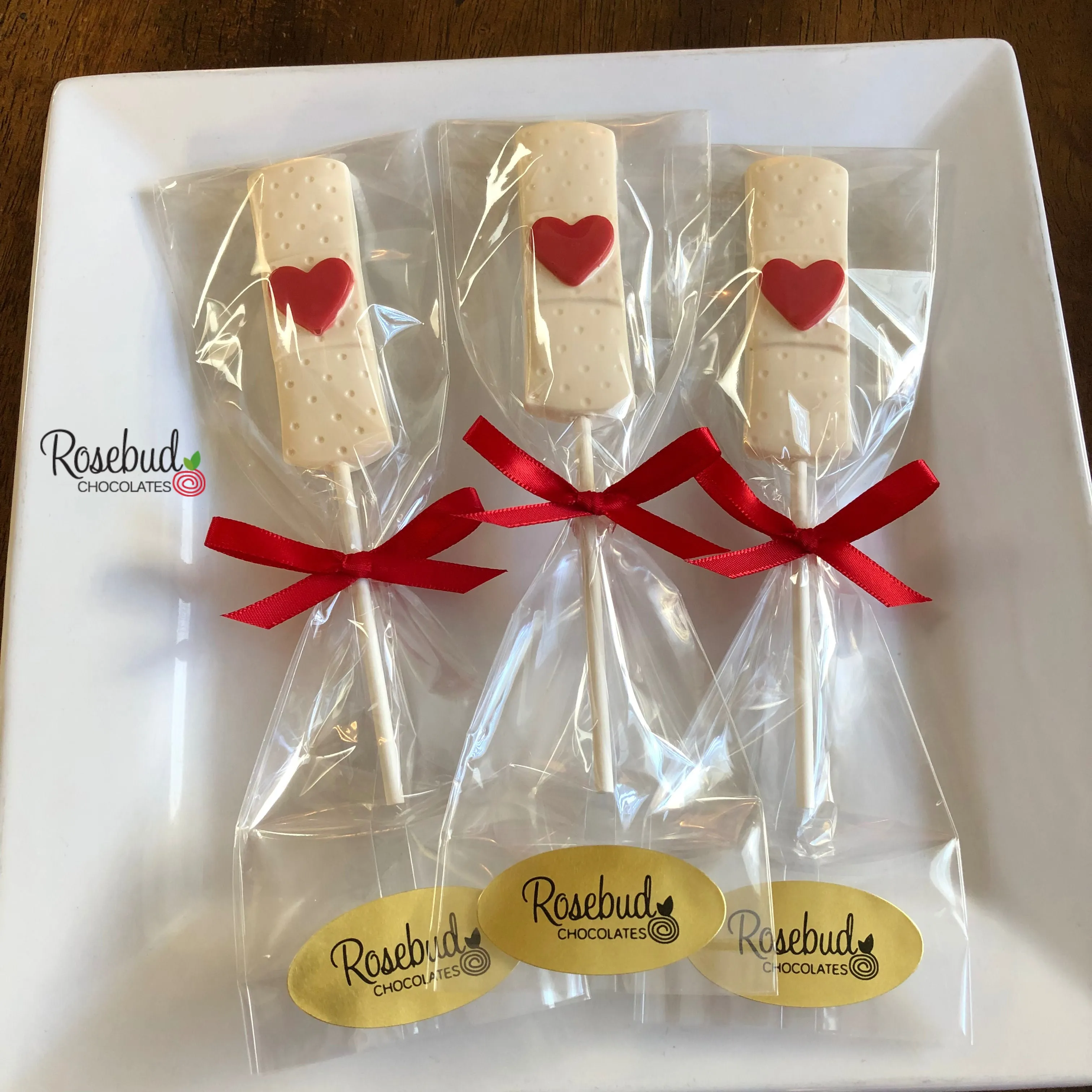 12 BAND-AID Chocolate Lollipop Candy Party Favors Heart