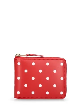 Comme des Garçons Wallet   Dot printed leather zip around wallet 